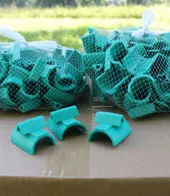Tutore in pvc . Protegge il tronco della pianta e si adatta alla sua crescita. Prodotto utilizzato nei vivai.  Protegge la corteccia dal filo di ferro. Agroplast  Villafranca di Verona